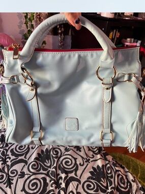 Dooney & Bourke Pale Blue Satchel with Tassel Accents